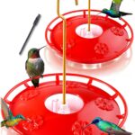 Two pure red eWonLife saucer hummingbird feeders with clear bases, hanging outdoors among green foliage.