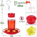 Two red Hpewi plastic hummingbird feeders with yellow flower feeding ports and ant moats, hanging outdoors.