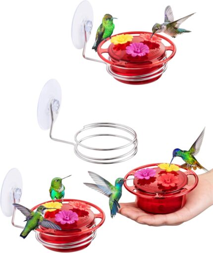 Three red iBorn window hummingbird feeders with clear nectar reservoirs, suction cups, and feeding ports.