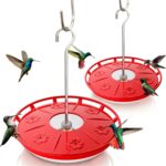 Two red Kingsyard saucer hummingbird feeders with clear bases and flower-shaped feeding ports, hanging outdoors.