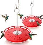 Two red Kingsyard saucer hummingbird feeders with clear bases and flower-shaped feeding ports, hanging outdoors.