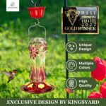 A vibrant Kingsyard Royal Red glass hummingbird feeder with a built-in ant moat and multiple feeding ports.